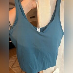 NWT Lululemon Align tank. Cropped length. A really pretty dusty, ocean blue.